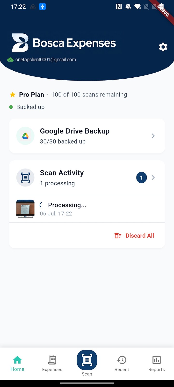 Home screen showing one scan processing in the background with a queued notification