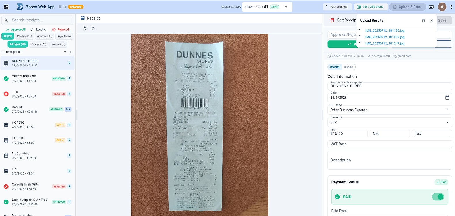 Upload and scan panel processing a batch of receipt photos in the portal